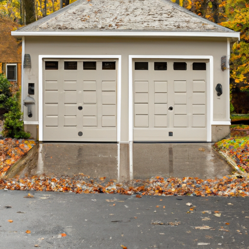 Suburban Wyckoff home with a closed modern steel garage door, driveway with autumn leaves, overcast sky.
