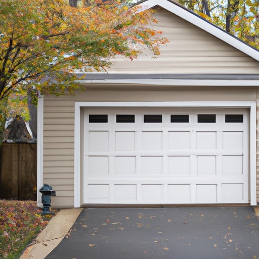 Closed insulated steel garage door on a suburban Wyckoff, NJ home with autumn trees and driveway visible.