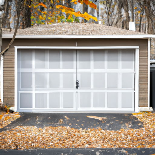Suburban Wyckoff garage door closed with autumn leaves on driveway, clear view of panels and hardware